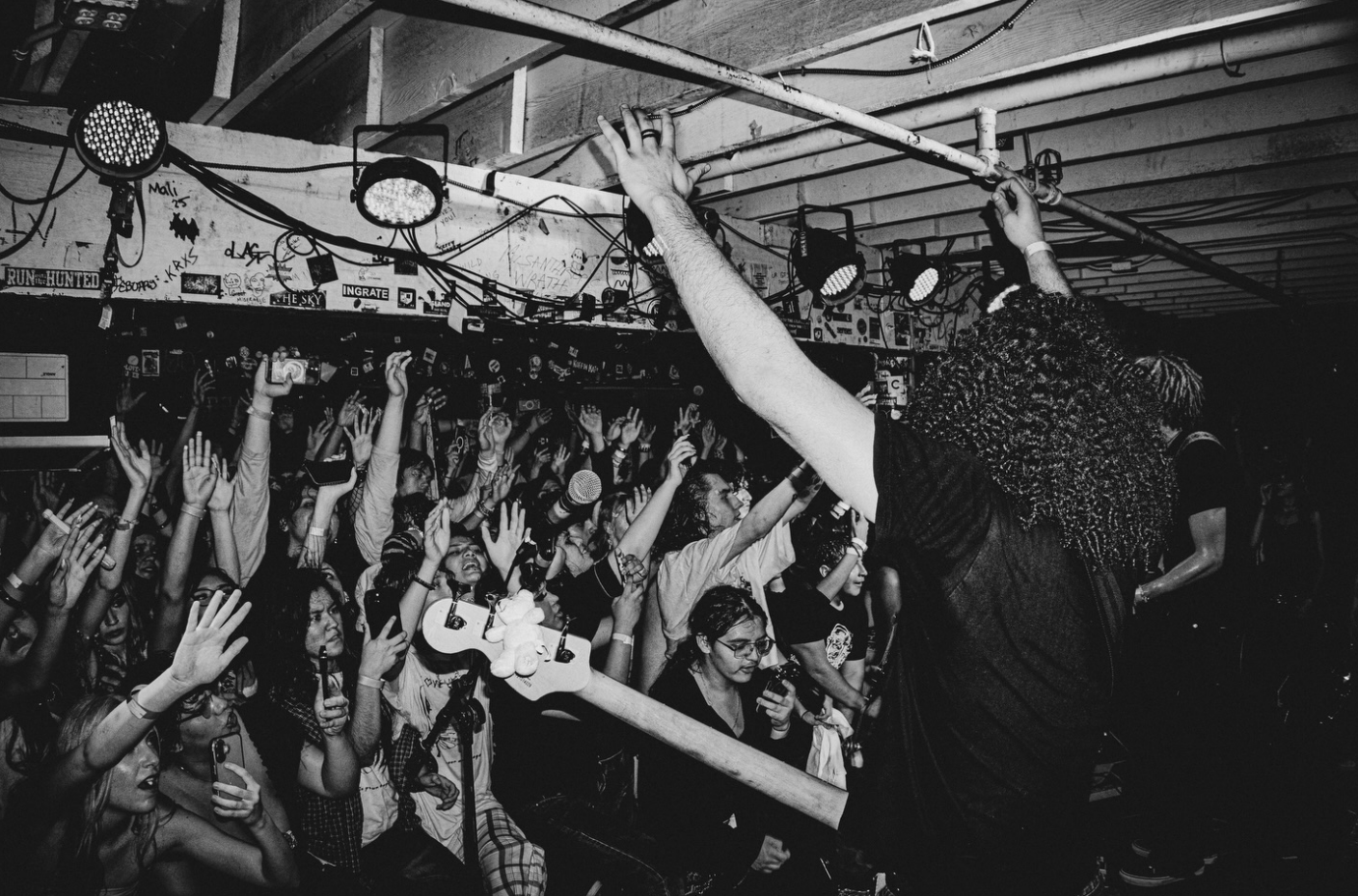 DIY concert moment with band and audience energy